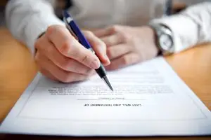 Third party administrator reviewing claims paperwork